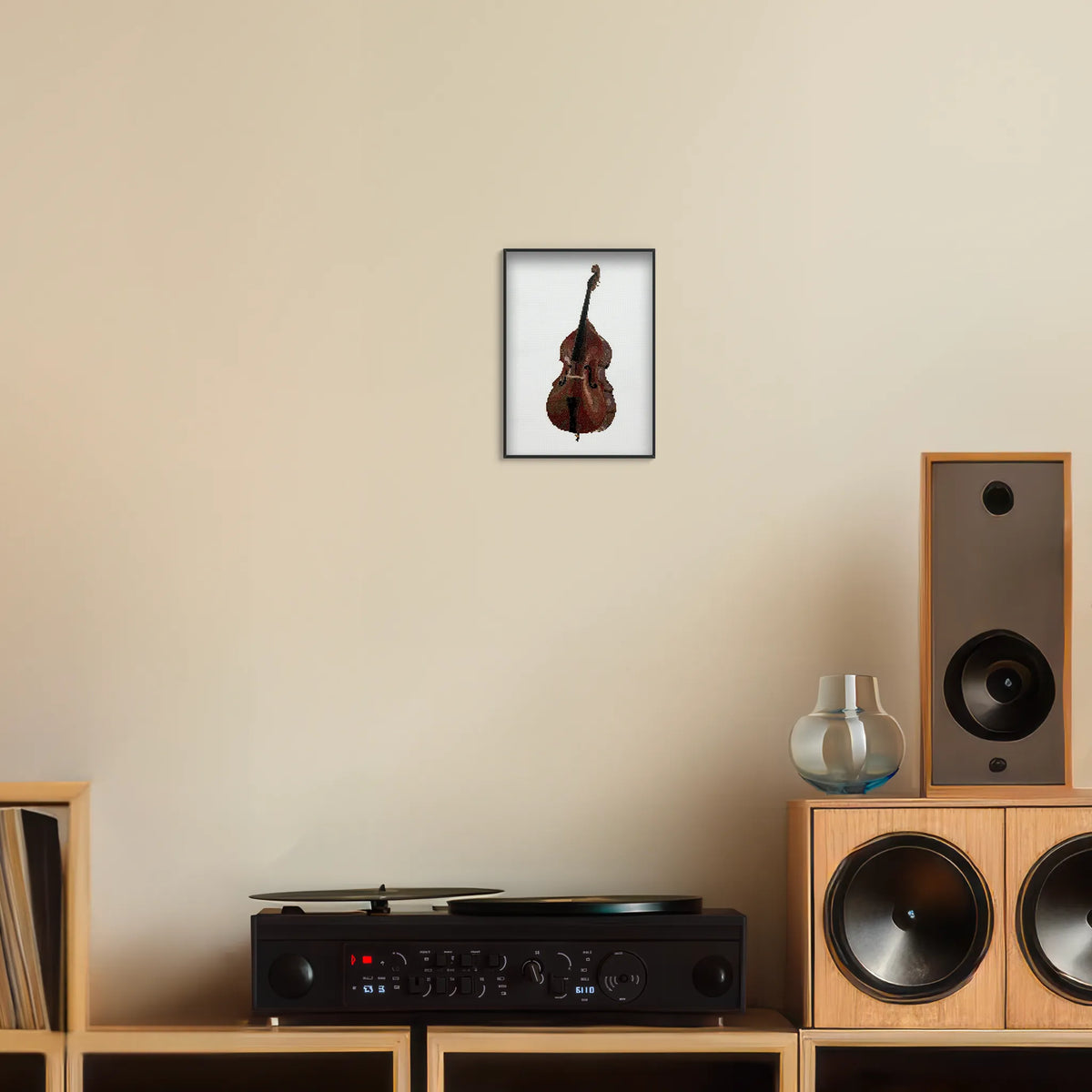 A5 print of the original embroidery design of a double bass framed and hung above a record player
