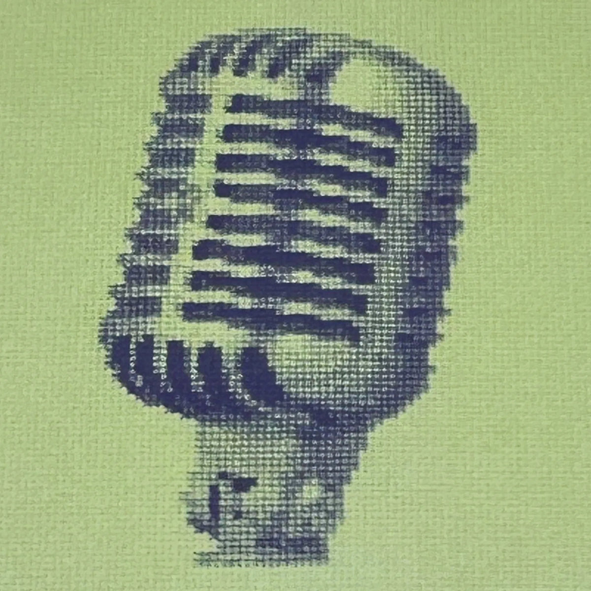 close up of the colourful postcard of the original embroidery vintage mic