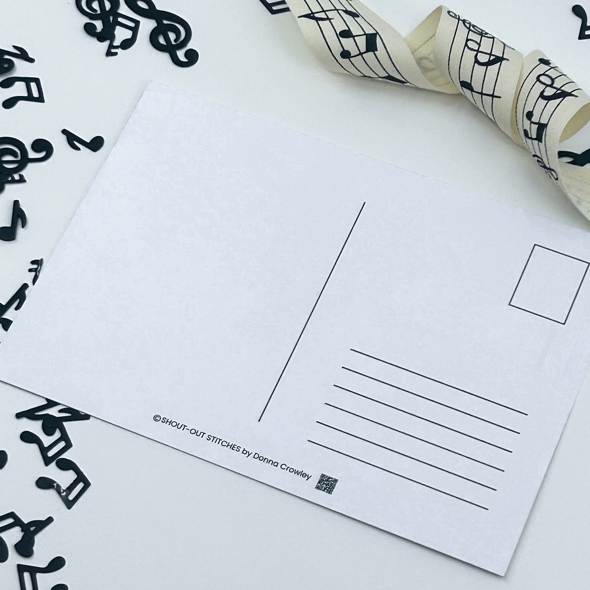 reverse side of the postcard divider for space to write lines for an address and placeholder for where to put a stamp