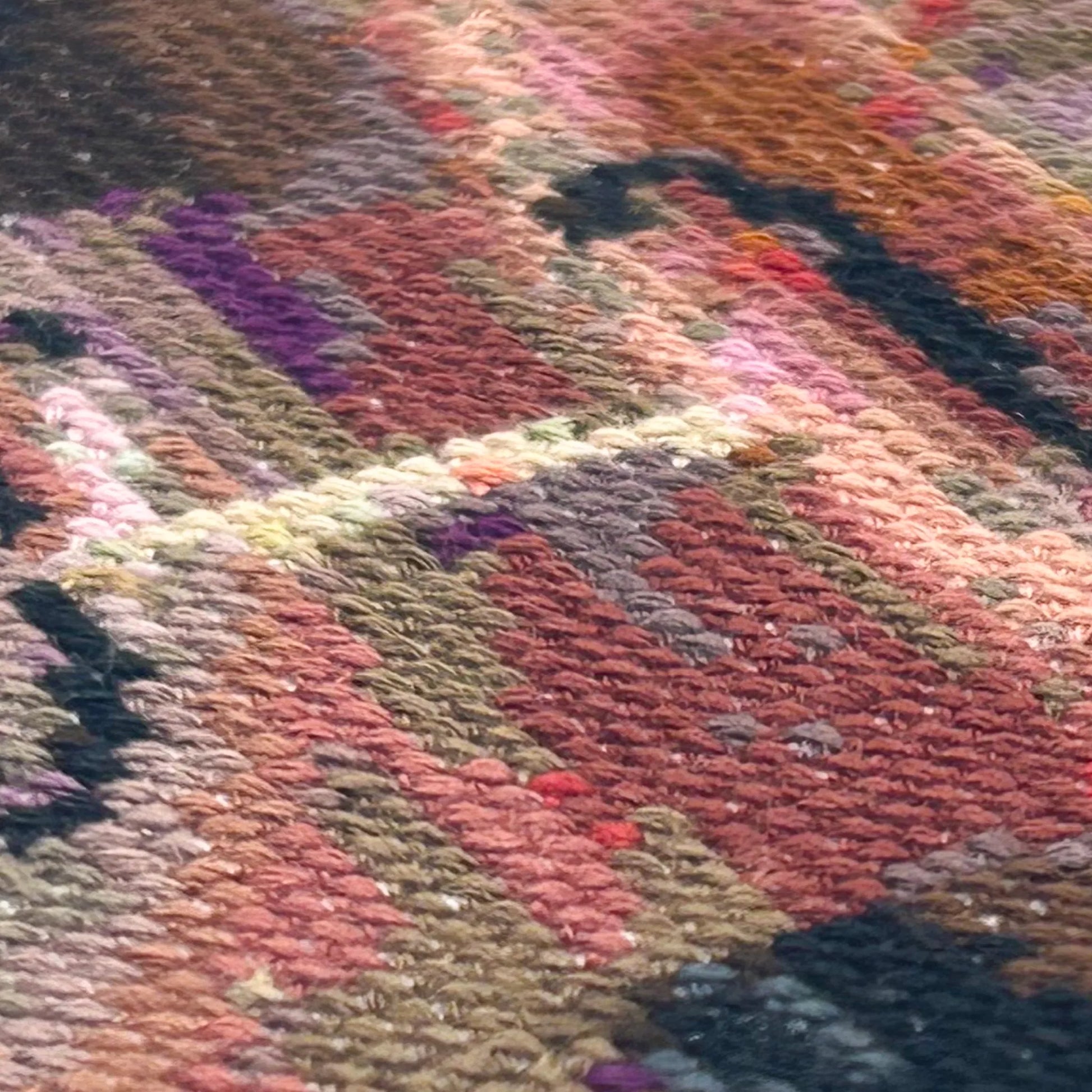 extreme close up of the stitches of an embroidered double bass