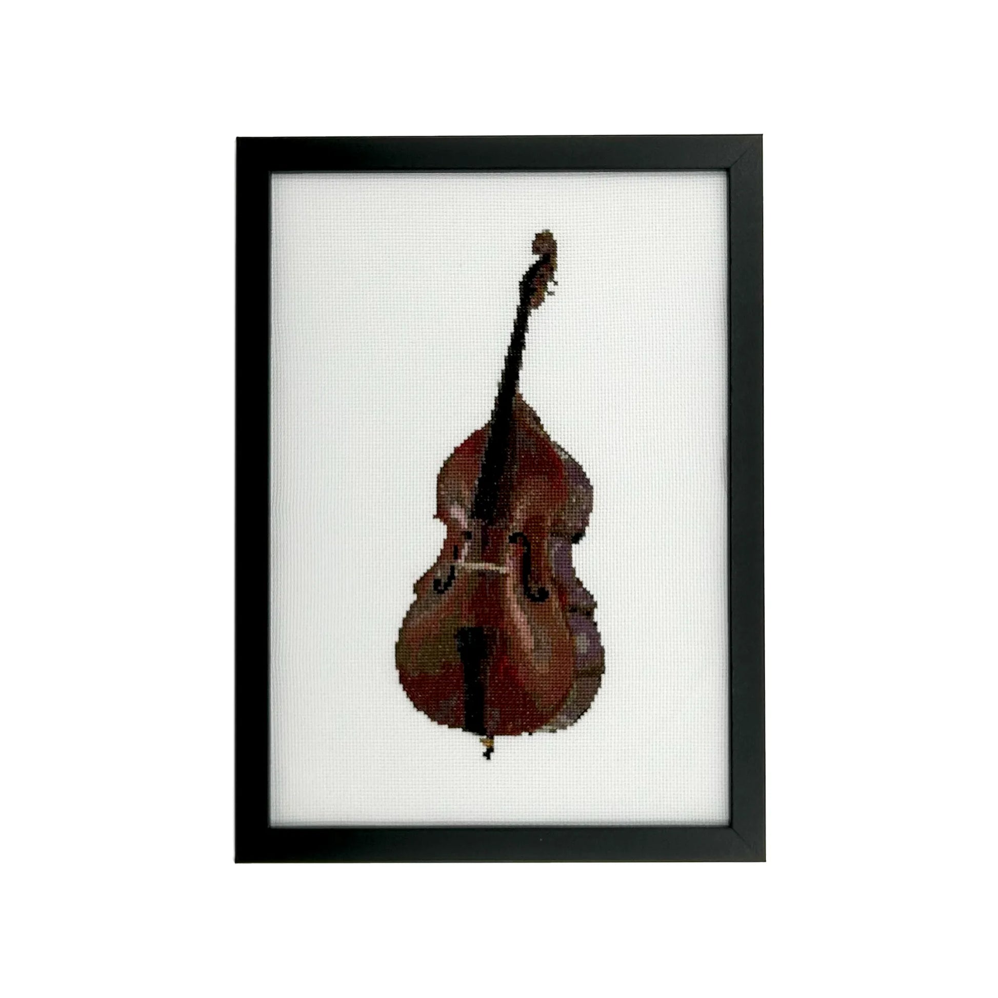 Framed cross stitch of a double bass on white fabric