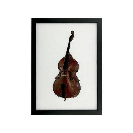 Framed cross stitch of a double bass on white fabric