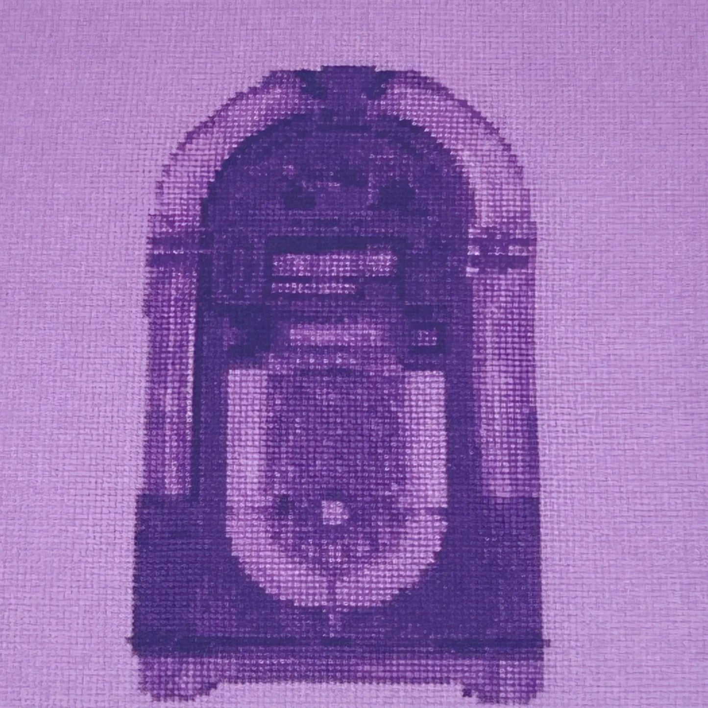 close up of the colourful postcard of the original embroidery design of a vintage jukebox