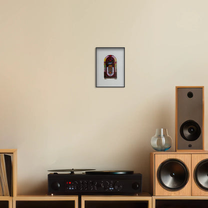 A5 print of the original embroidery design of a vintage jukebox framed and hung up on a wall above a record player