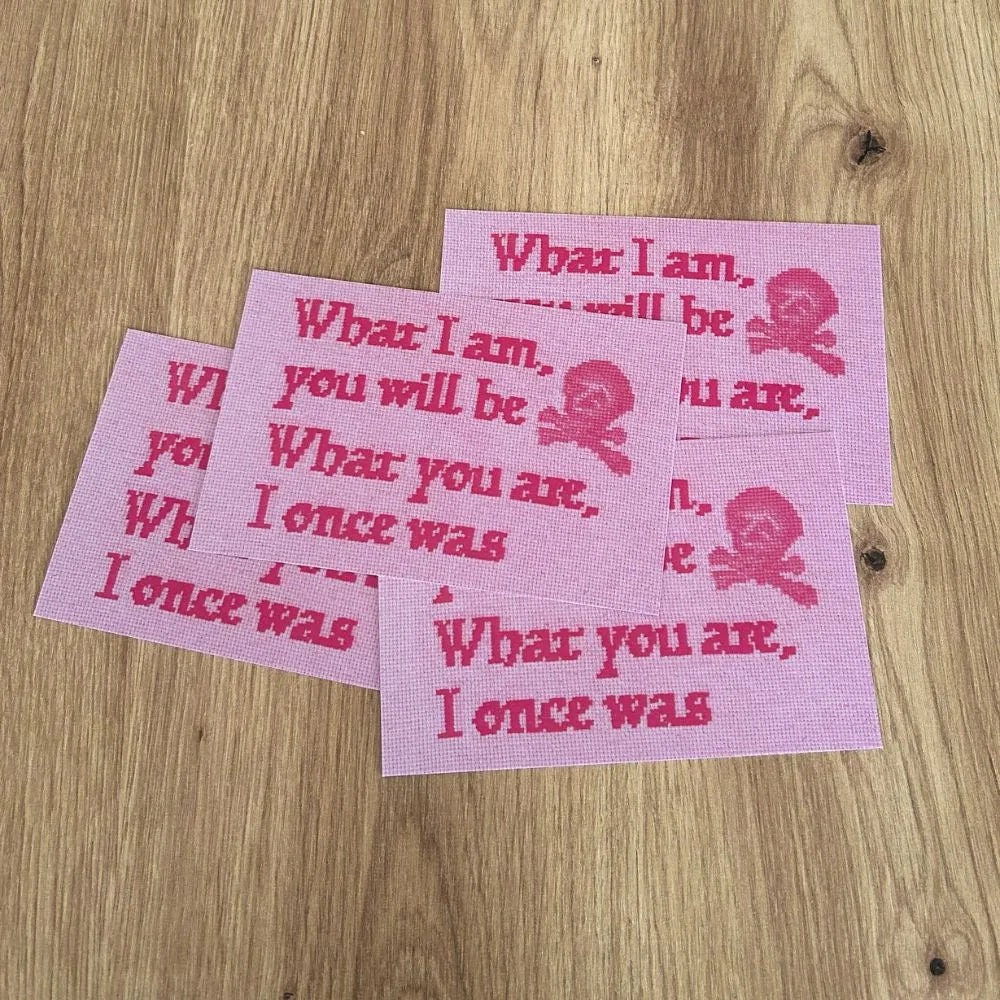 What I am, you will be What you are, I once was memento mori quote on a postcard in pink