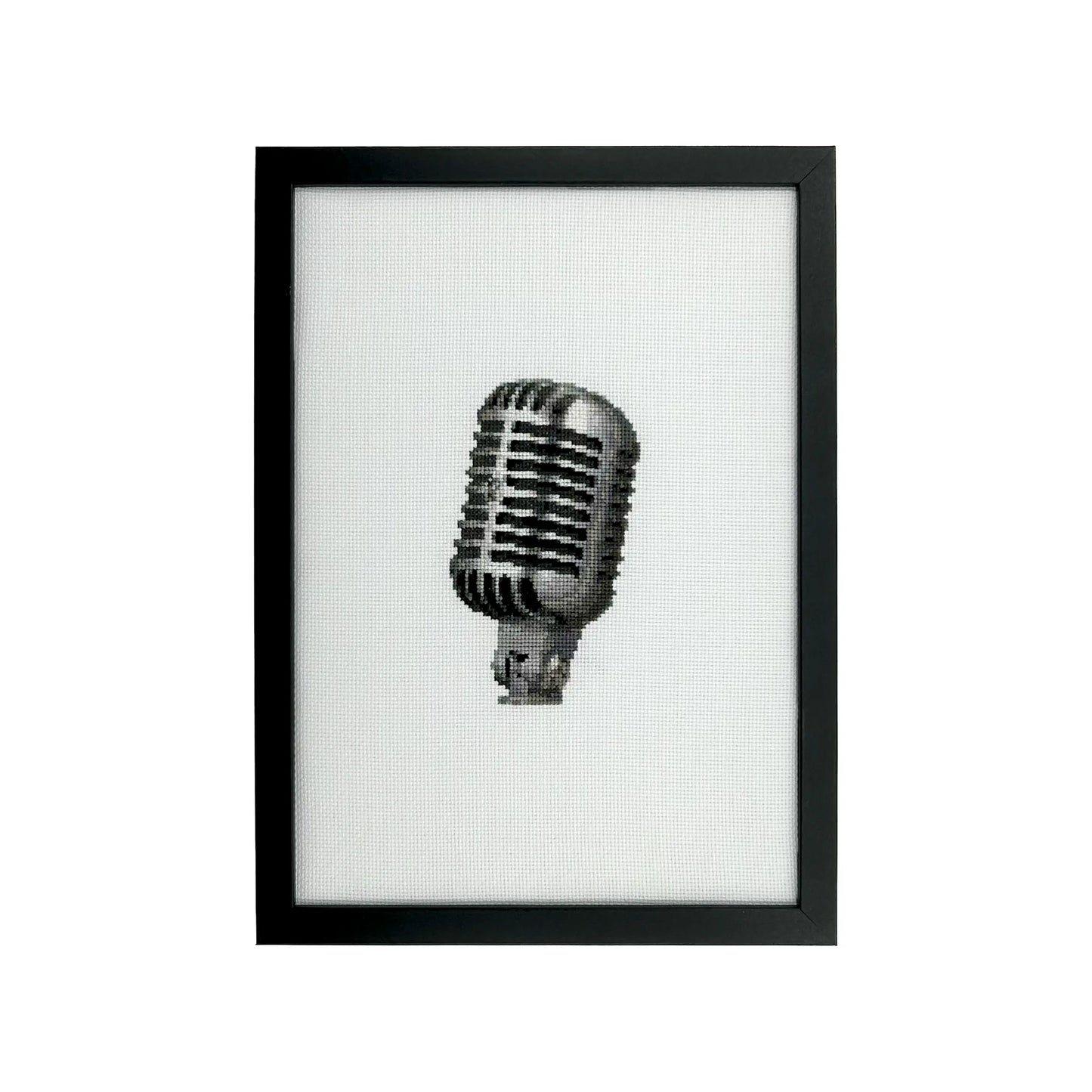 Framed artwork of a vintage microphone on a white background