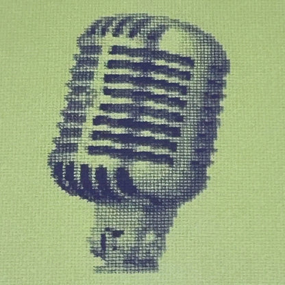 close up of the colourful postcard of the original embroidery vintage mic 