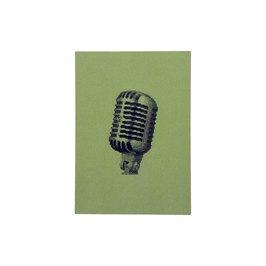 postcard of the shure 55SH mic original embroidery greyscale mic on a green background