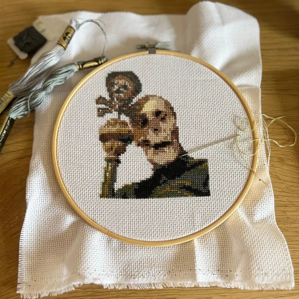 Robed skeleton completed embroidery in hoop.