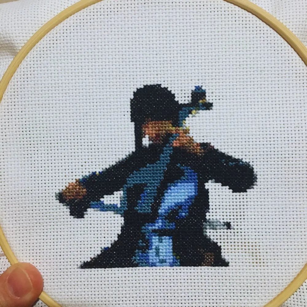 wednesday addams playing the cello embroidery in hoop