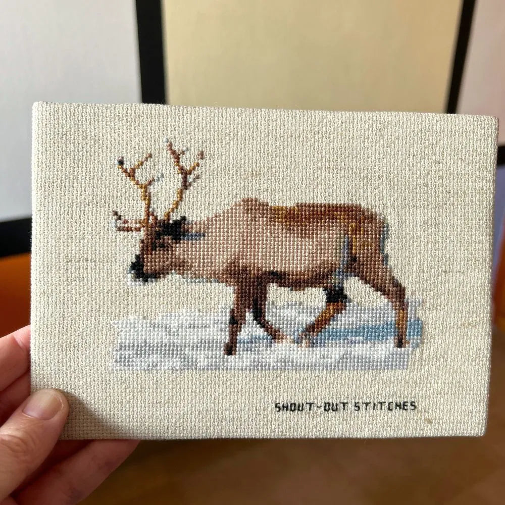 Unframed reindeer in the snow embroidery.